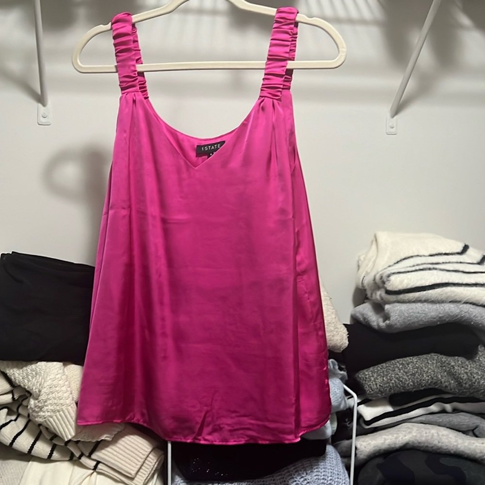 1. State sleeveless top pink. Never worn no tags